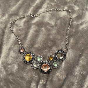 Necklace to match so much fall outfits.    Faux gemstones are green and orange.